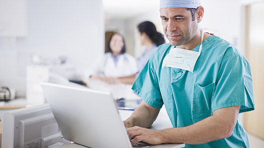 doctor with computer