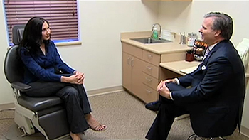 Scioscia consults with patient