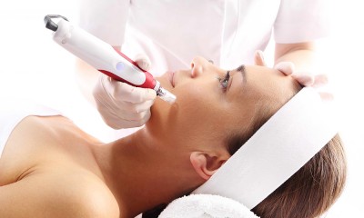 Woman having a microneedling treatment.