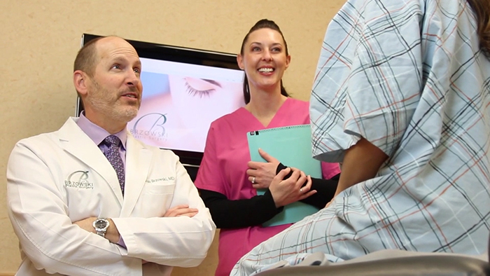 Dr. Brzowski with patient.